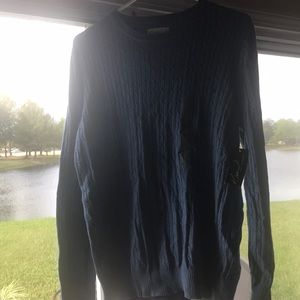 Ladies cable knit baby blue sweater.